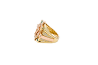 14KT Gold Ring Men's Square Two Tone Raised Oval Santa Muerte with Sunray Background and Corner Design One Green CZ Stone Shank Design Double Row White CZ Stone Interlocking Top/Side Cross