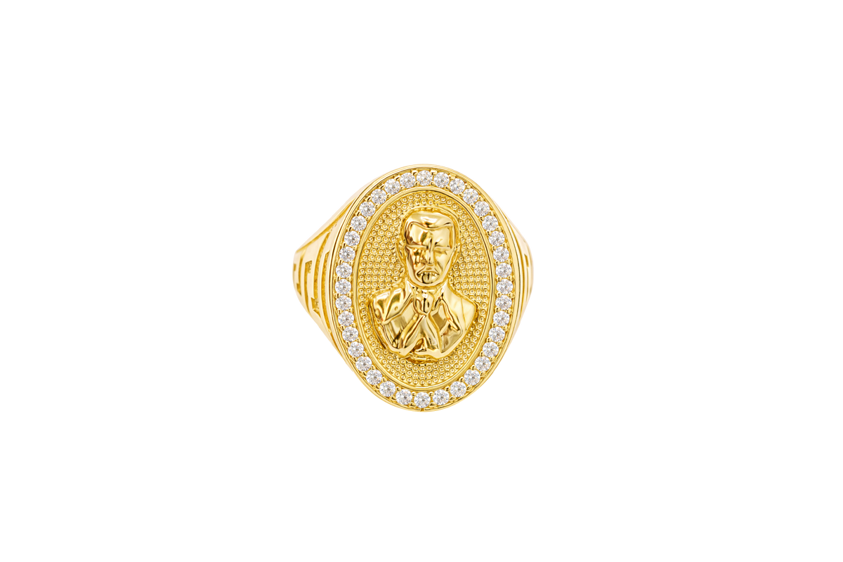 14K Gold Ring Men's Oval Coin Malverde Center with White CZ Stone Border and Greek Style Design on Each Sides
