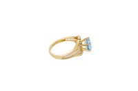 14KT Gold Ring Women's Light Blue Round 6 Prong Center CZ with White Baguette CZ Band and Plain Lips Border