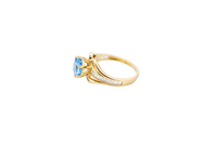 14KT Gold Ring Women's Light Blue Round 6 Prong Center CZ with White Baguette CZ Band and Plain Lips Border