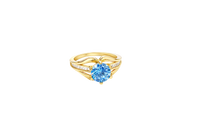14KT Gold Ring Women's Light Blue Round 6 Prong Center CZ with White Baguette CZ Band and Plain Lips Border
