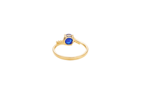 14KT Gold Ring Women's Navy Blue Oval Center CZ Stone with 3 High/Low Round White CZ Stones Shoulders and Plain Band