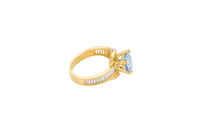 14KT Gold Ring Women's Round Light Blue CZ Center Stone and Single Row White CZ Baguettes with "S" Band