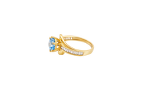 14KT Gold Ring Women's Round Light Blue CZ Center Stone and Single Row White CZ Baguettes with "S" Band