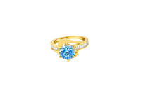 14KT Gold Ring Women's Round Light Blue CZ Center Stone and Single Row White CZ Baguettes with "S" Band