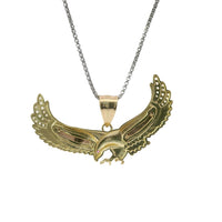 14KT Gold Charm Large Tri Tone Soring Eagle with Red CZ Eye, White CZ Stones Wing Tips, and Plain Bell