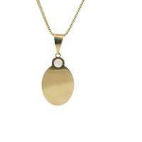 14KT Gold Charm Medium Oval Virgin Mary Sunray Coin with White CZ Stones Top and Plain Bell