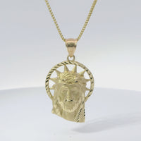 14KT Gold Charm Medium Diamond Cut Slant Bottom Open Liberty Halo Jesus Head Front Portrait with Plain Bell