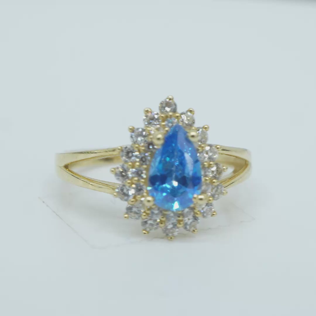 14KT Gold Ring Women's Pear Turquoise CZ Center with Round Double White CZ Stones Border and Plain Split Band