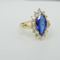 14KT Women's Gold Ring Jumbo Navy Blue Marquise Center CZ with Round White CZ Stones Border and Plain Split Band