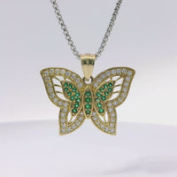 14KT Gold Charm Dark Green CZ Center Butterfly with White CZ Stone Wings Border and Plain Bell