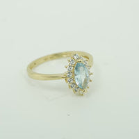 14KT Gold Ring Women's Flower Light Blue Marquise Center CZ Stone with White CZ Stone Petal Borders and Plain Band
