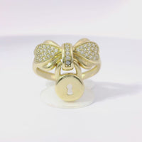 14KT Gold Ring Women's White CZ Stones Heart Shaped Bow with Round Hanging Padlock and Plain Band