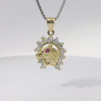 14KT Gold Charm Medium Red Eye Horsehead Center with White CZ Stones Horseshoe Border and Plain Bell