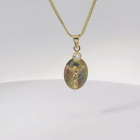 14KT Gold Charm Small Tri Tone Oval Crucifix Graphic Coin with White CZ Stone Top and Plain Bell