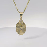 14KT Gold Charm Medium Two Tone Oval Crucifix Sunray Coin with White CZ Stones Top and Plain Bell