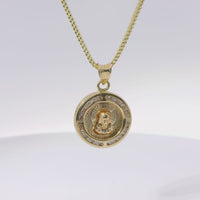 14KT Gold Charm Small 3D Round Double Sided Tri Tone Graphic Line Background Virgin Mary / Jesus Coin with White CZ Stones Edge and Plain Bell