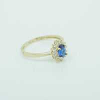 14KT Gold Ring Women's Flower Oval Navy Blue Center Stone with White CZ Stone Petals Border Plain Band