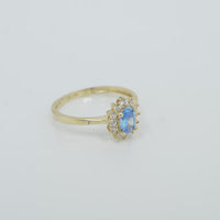 14KT Gold Ring Women's Flower Oval Turquoise Center Stone with White CZ Stone Petals Border Plain Band