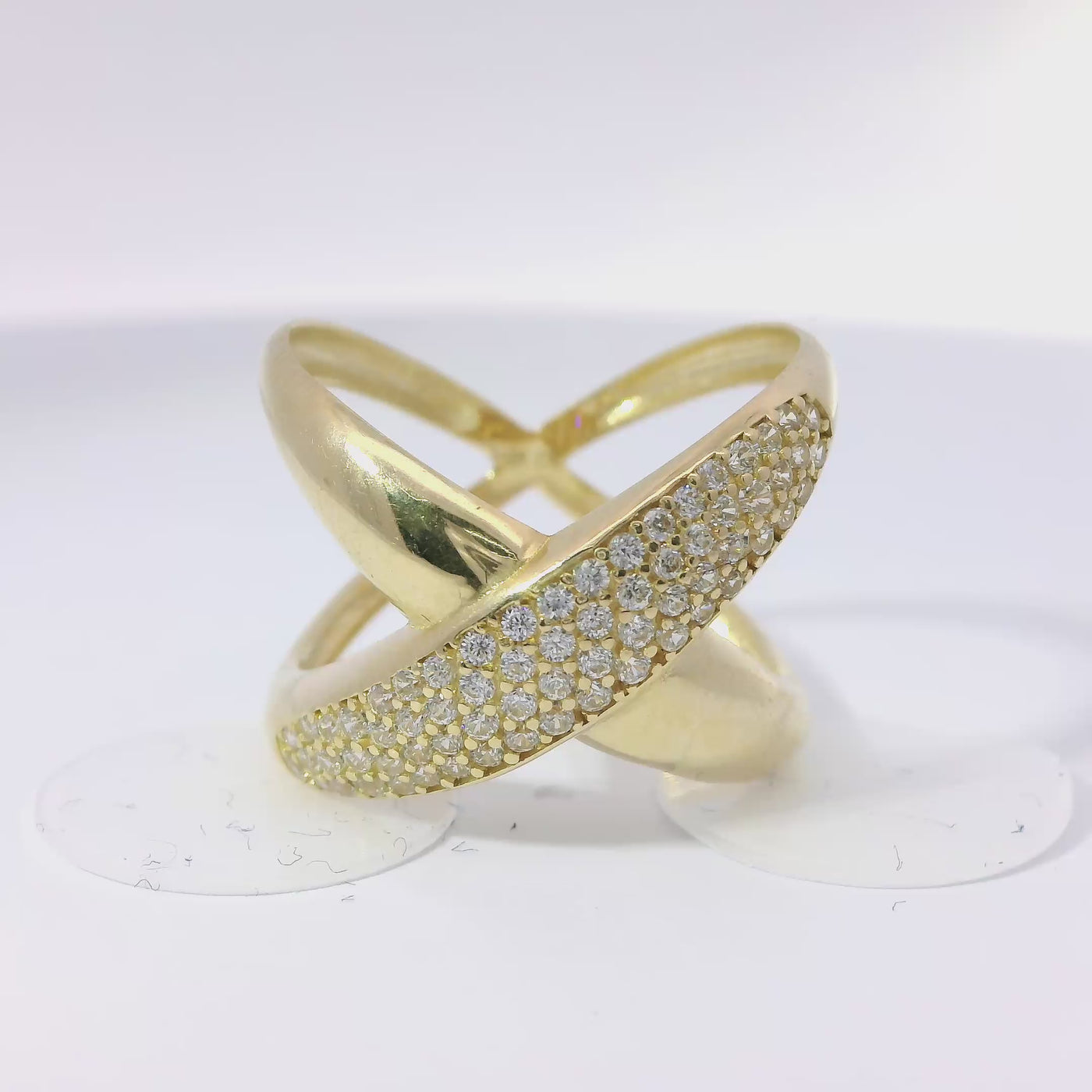 14KT Gold Ring Women's Puff "X" Center with One White CZ Stones Leg and Plain Split Band