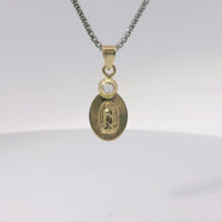 14KT Gold Charm Extra Small Oval Virgin Mary Sunray Coin with White CZ Stone Top and Plain Bell