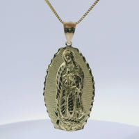 14KT Gold Charm Extra Large Oval Virgin Mary with Diamond Cut Spiked Edge and Plain Bell