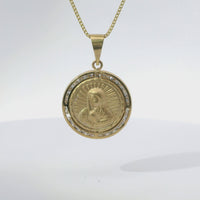 14KT Gold Charm Medium Puff Virgin Mary Coin with White CZ Stone Border and Plain Bell