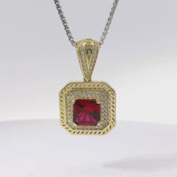 14KT Gold Charm Large Red Square Center CZ Stone Double Platform Border of Round White CZ Stones Mock Link Border and Bell