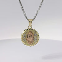 14KT Gold Charm Medium Round Tri Tone Virgin Mary Swirl Center Diamond Cut Border Coin with White CZ Stone Flower and Plain Bell