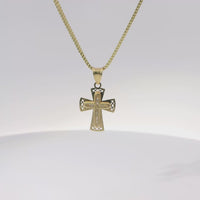 14KT Gold Charm Extra Small White CZ Stone Cross Center with Plain Rounded Flared Diamond Shape Cutout Ends Border and Plain Bell