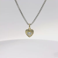 14KT Gold Charm Extra Small White Heart CZ Stone Center with Sunray Border and Plain Oval Bell